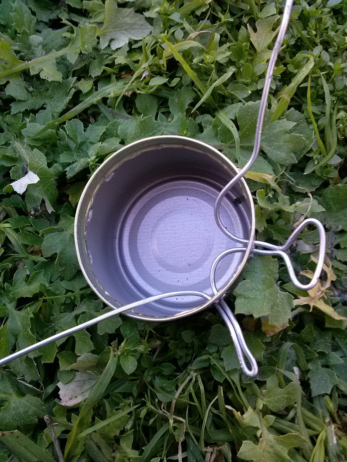 13 Step 11 Pull the Metal Wire Back Inside the Can and Then Form the Head.jpg