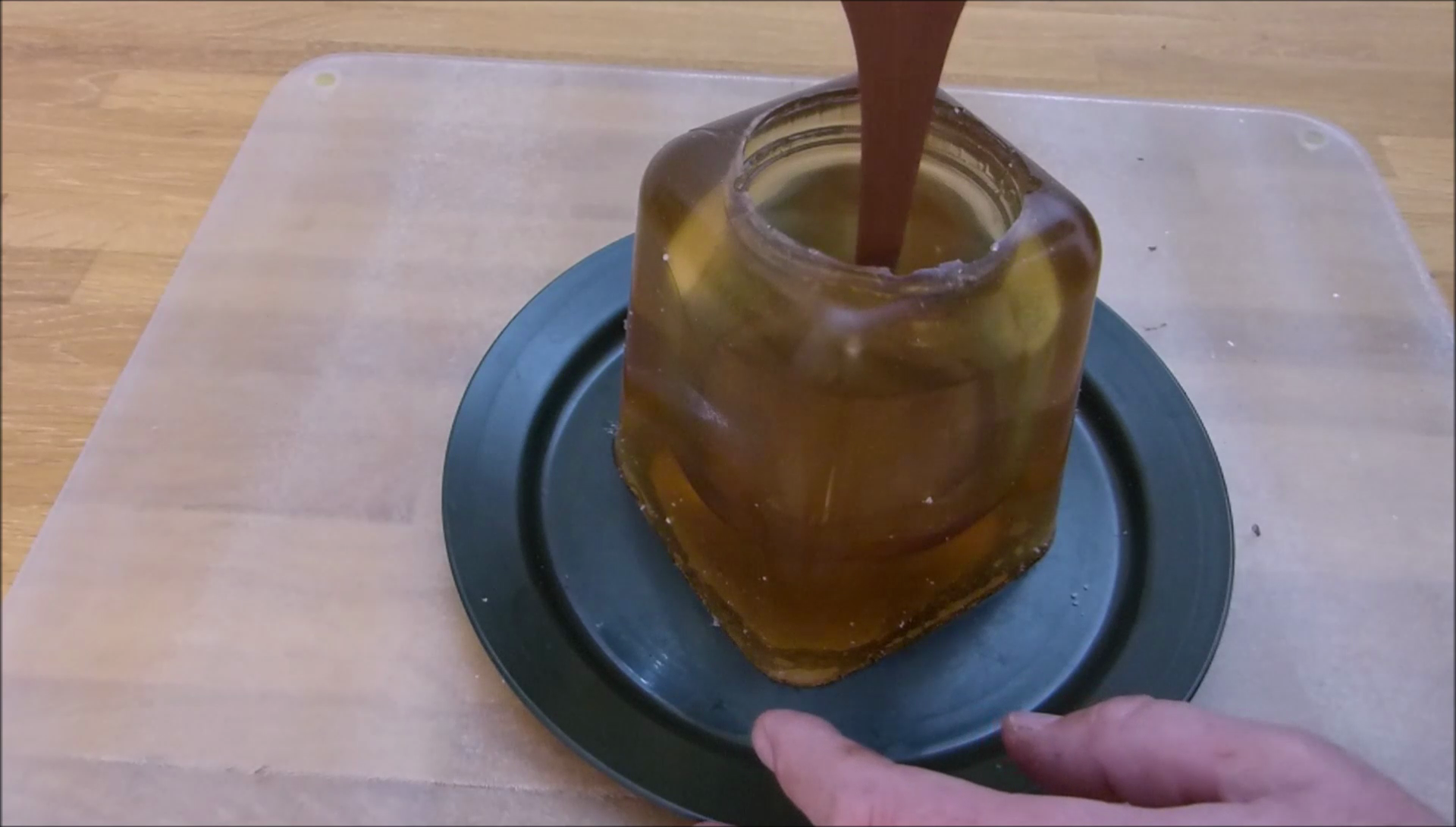 150 pour chocolate into nutella jar mould.png