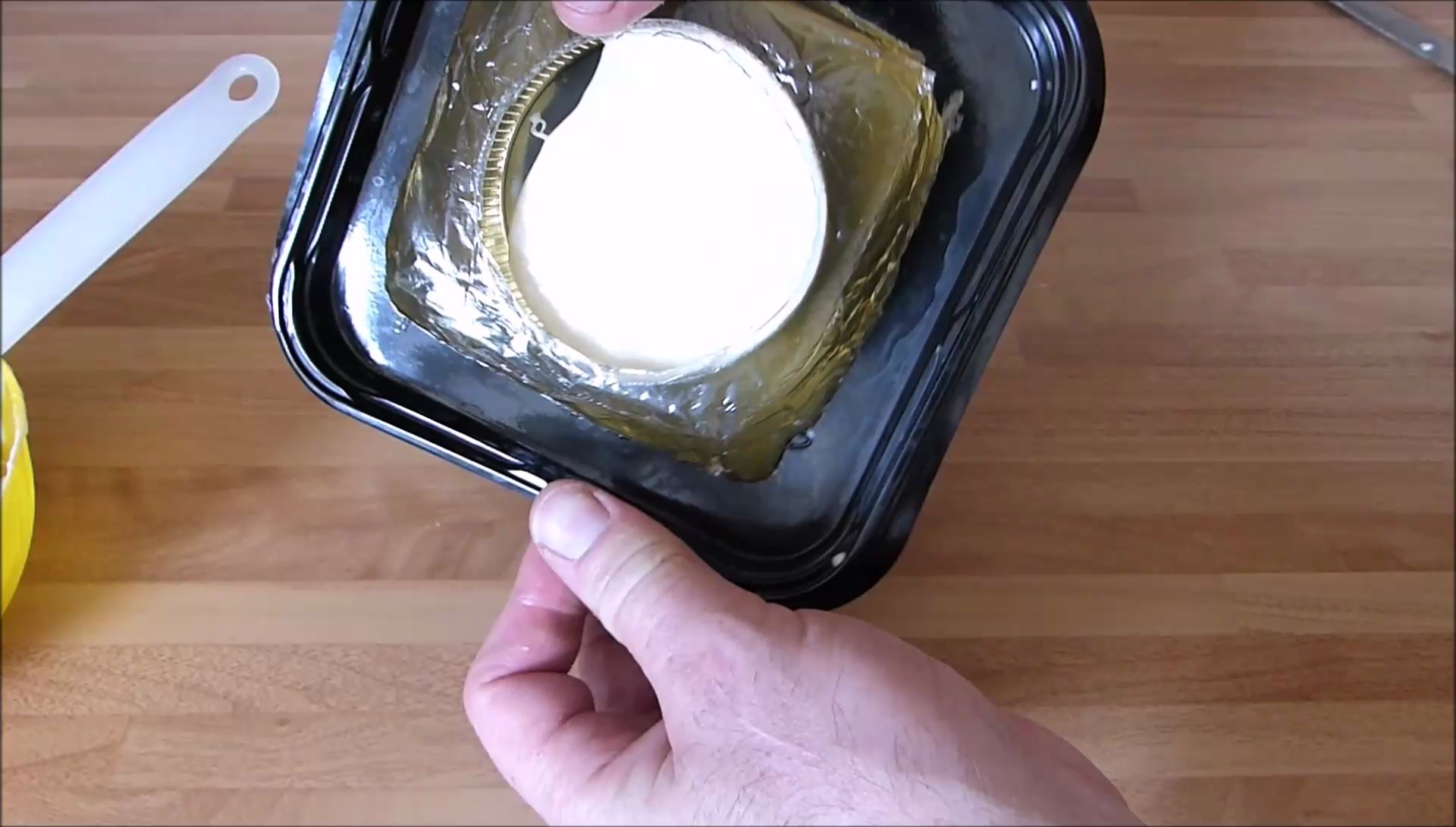 203 rotate white chocolate around the mould.png