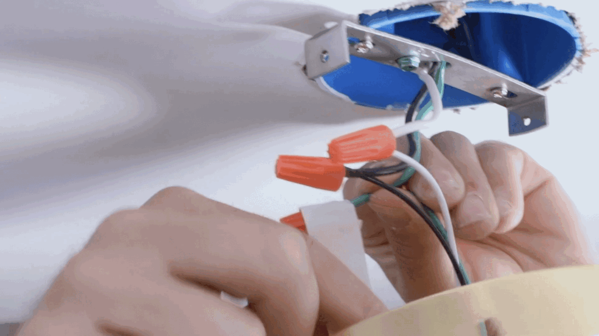 Installing a flush mount fixture - step 3 - wiring green tape.gif
