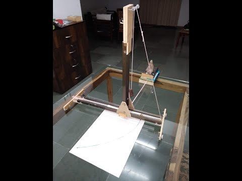 Parabola being drawn with the instrument GAUTAM (Gravity Assisted Upturned T Arch Maker)