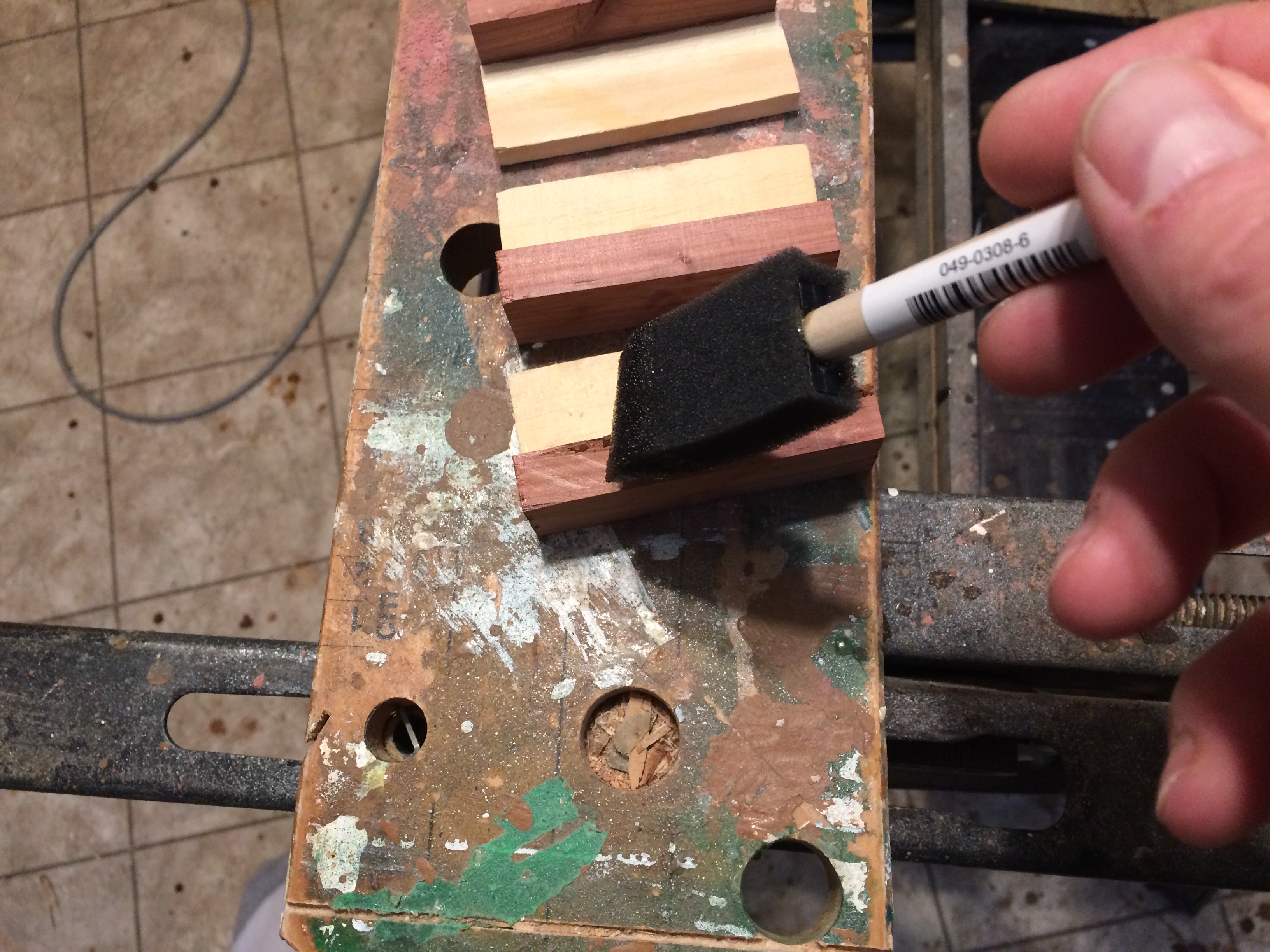 Step 12 - varnishing the mounts.JPG