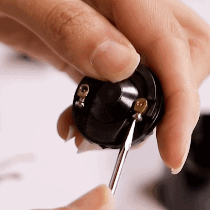 Step 3 - unscrewing the terminal to wire your light (cropped square).gif