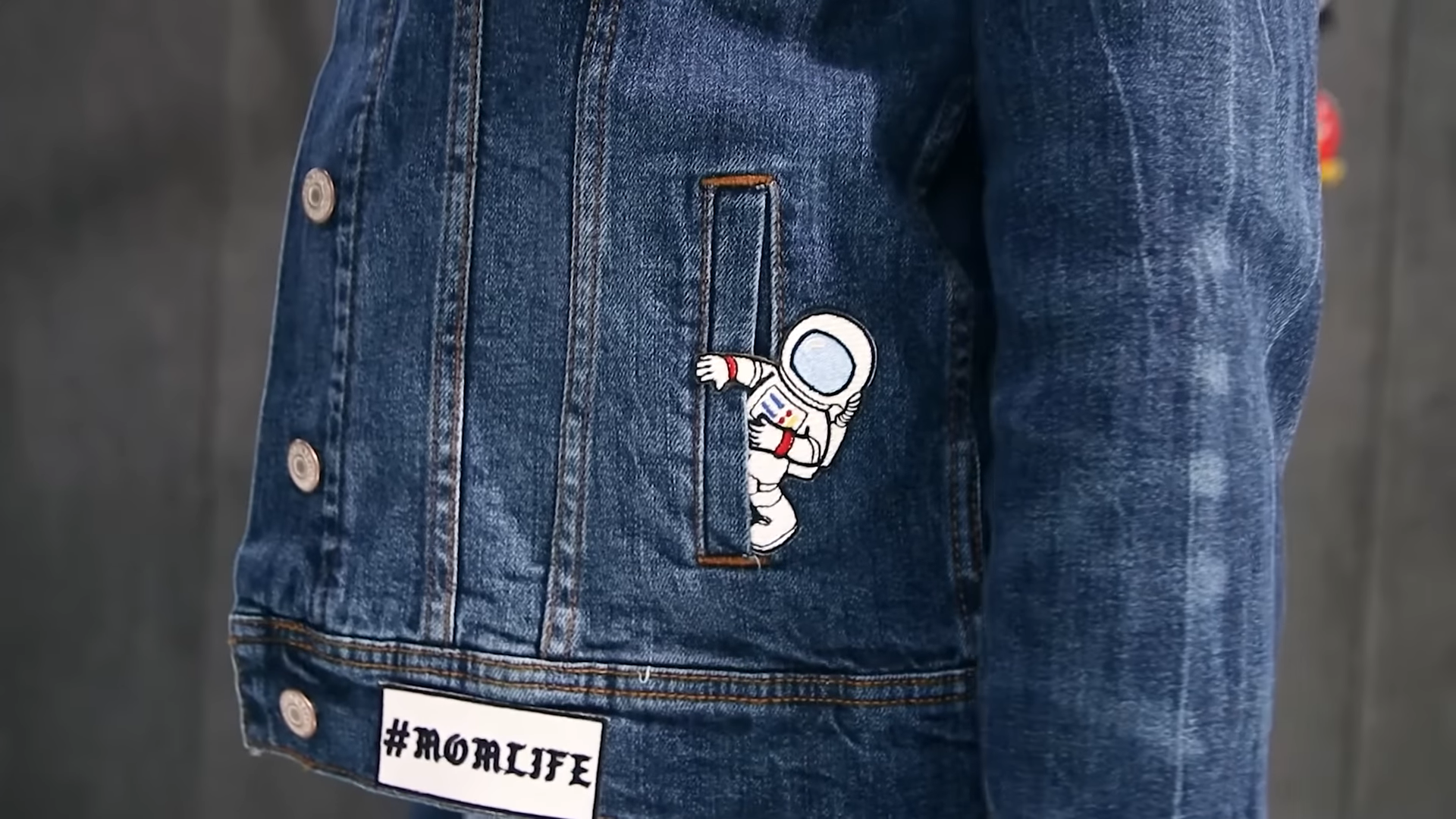 close-up of the pocket with the Astronaut and #MOMLIFE patches.png