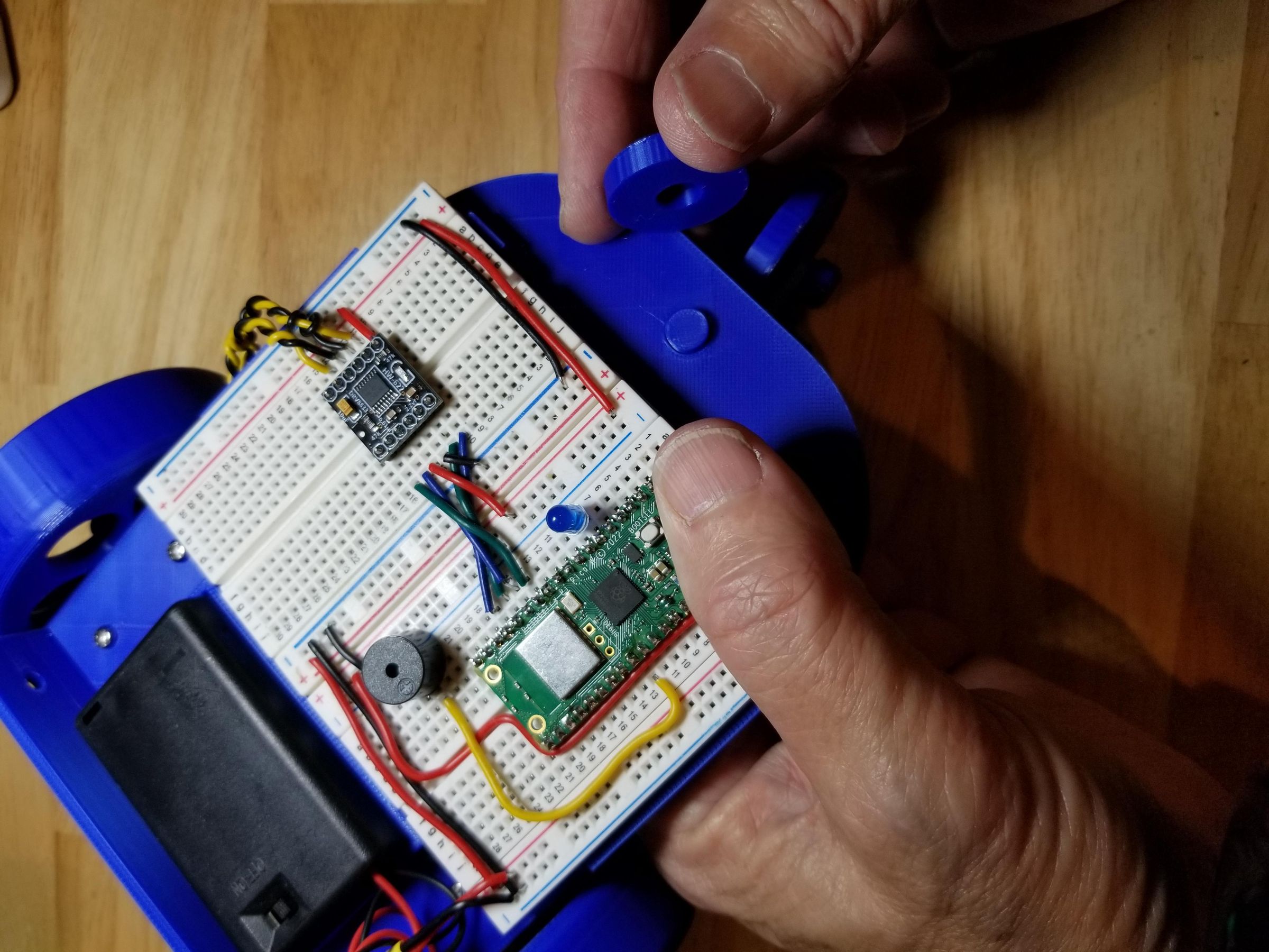 fasten caster wheel assembly to chassus.jpg