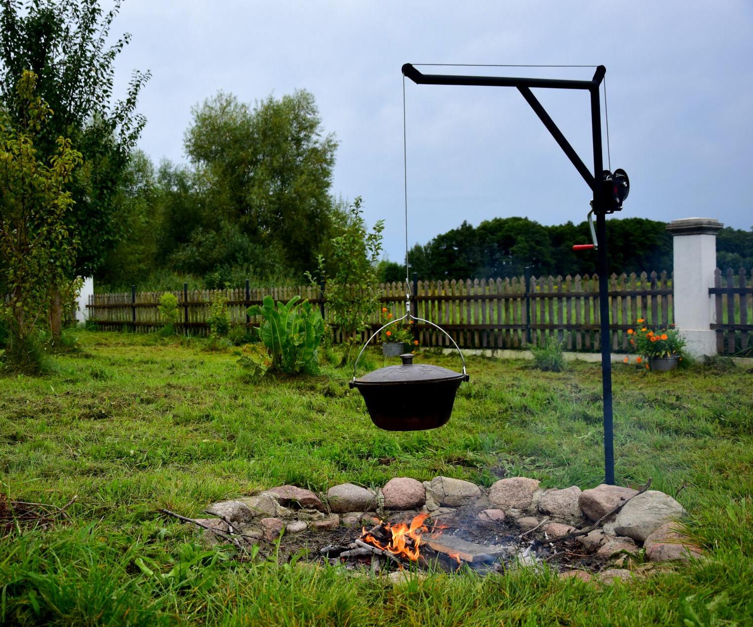 Clever Grill and Iron Kettle Over Fireplace
