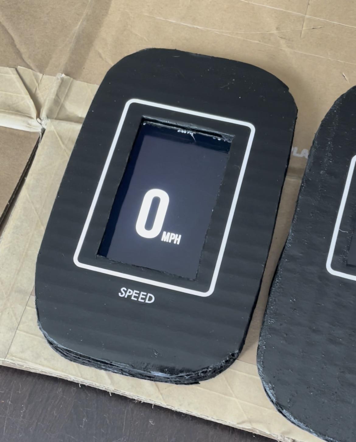 Upcycling Old Smartphones Into Physical Widgets for Skiing: Cardboard, Spray Paint, and Cricut Vinyl Cutter.