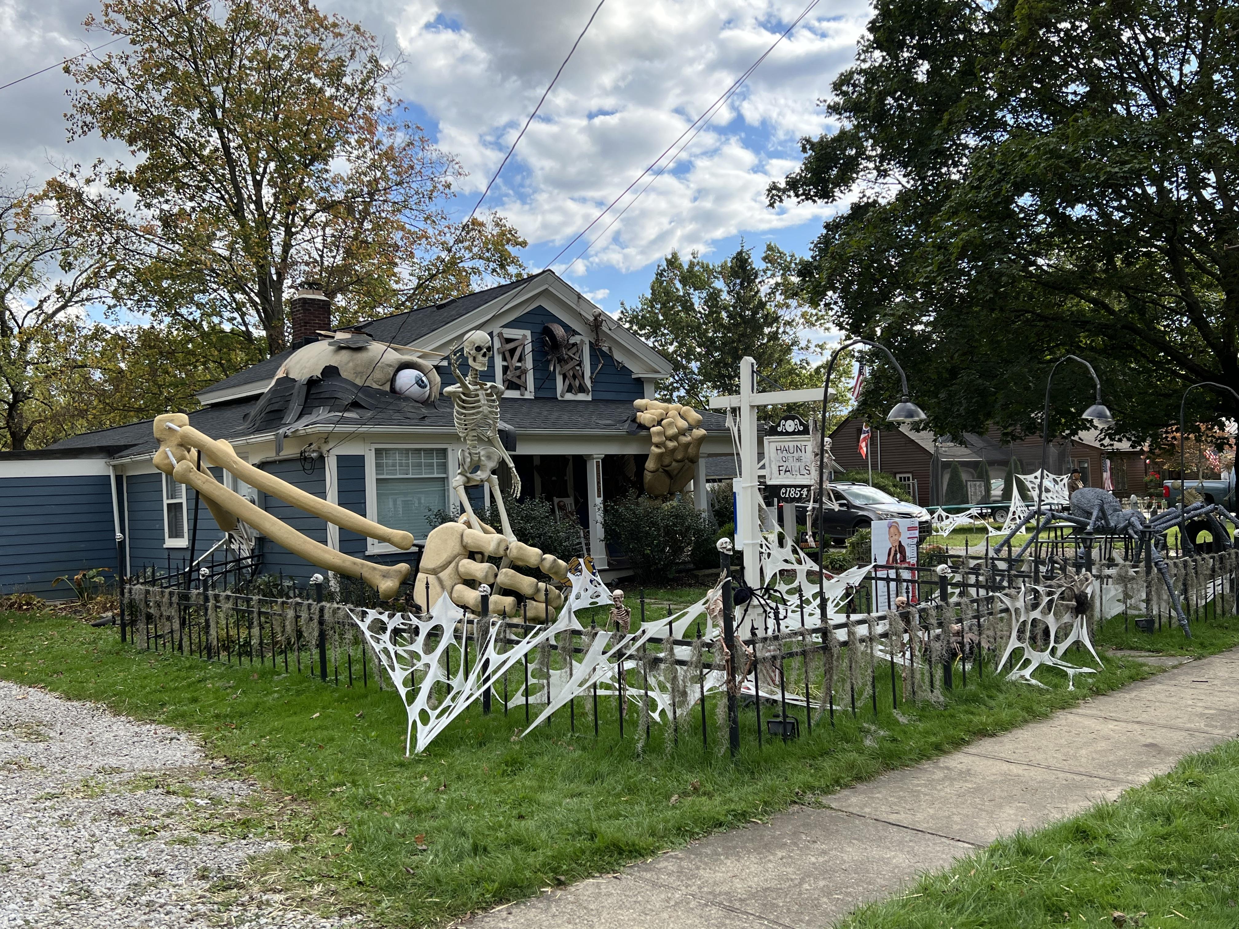 Over Sized Skeleton Breaking Out of My Home