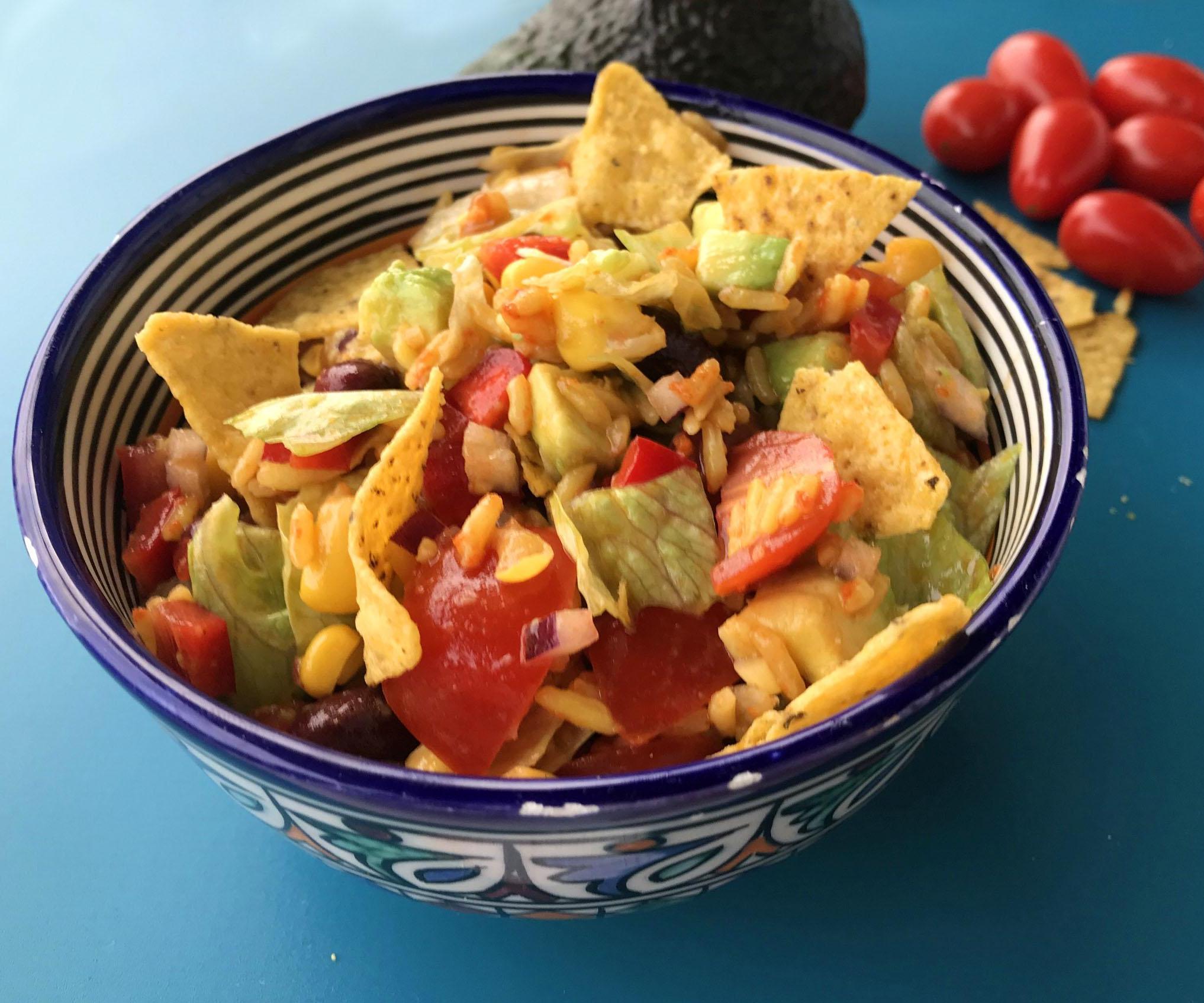 colorful rice salad with crunchy nacho bites