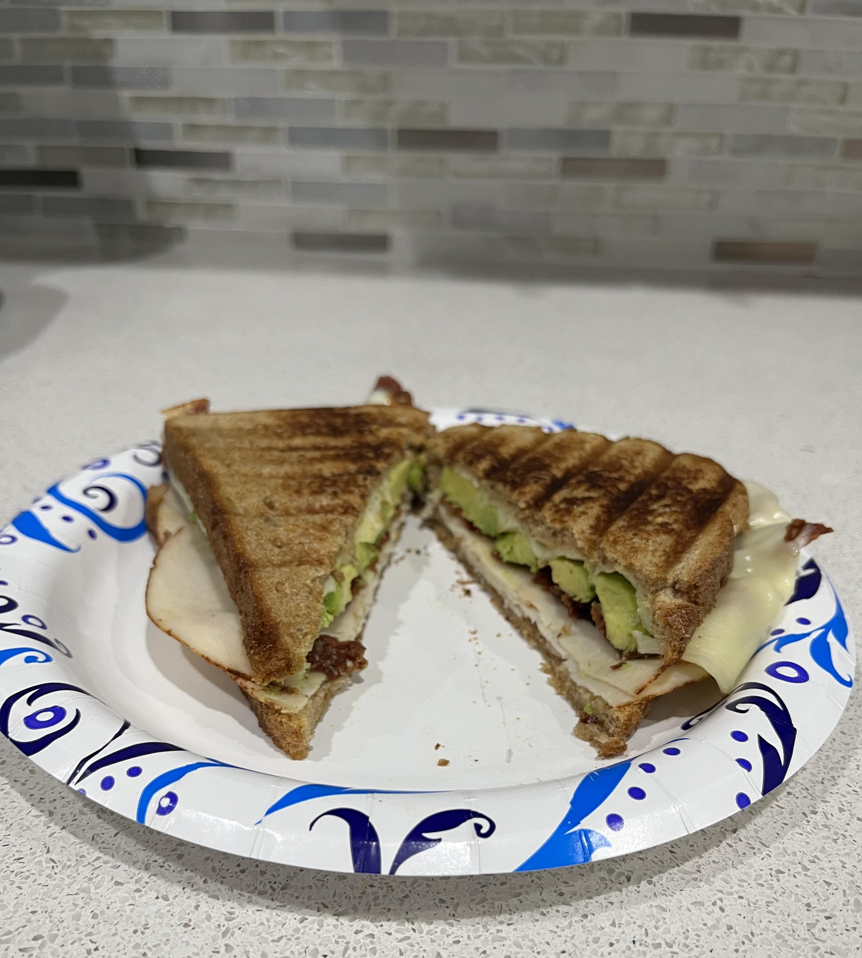 Avocado, Bacon, Cheese, and Chicken Panini Sandwich