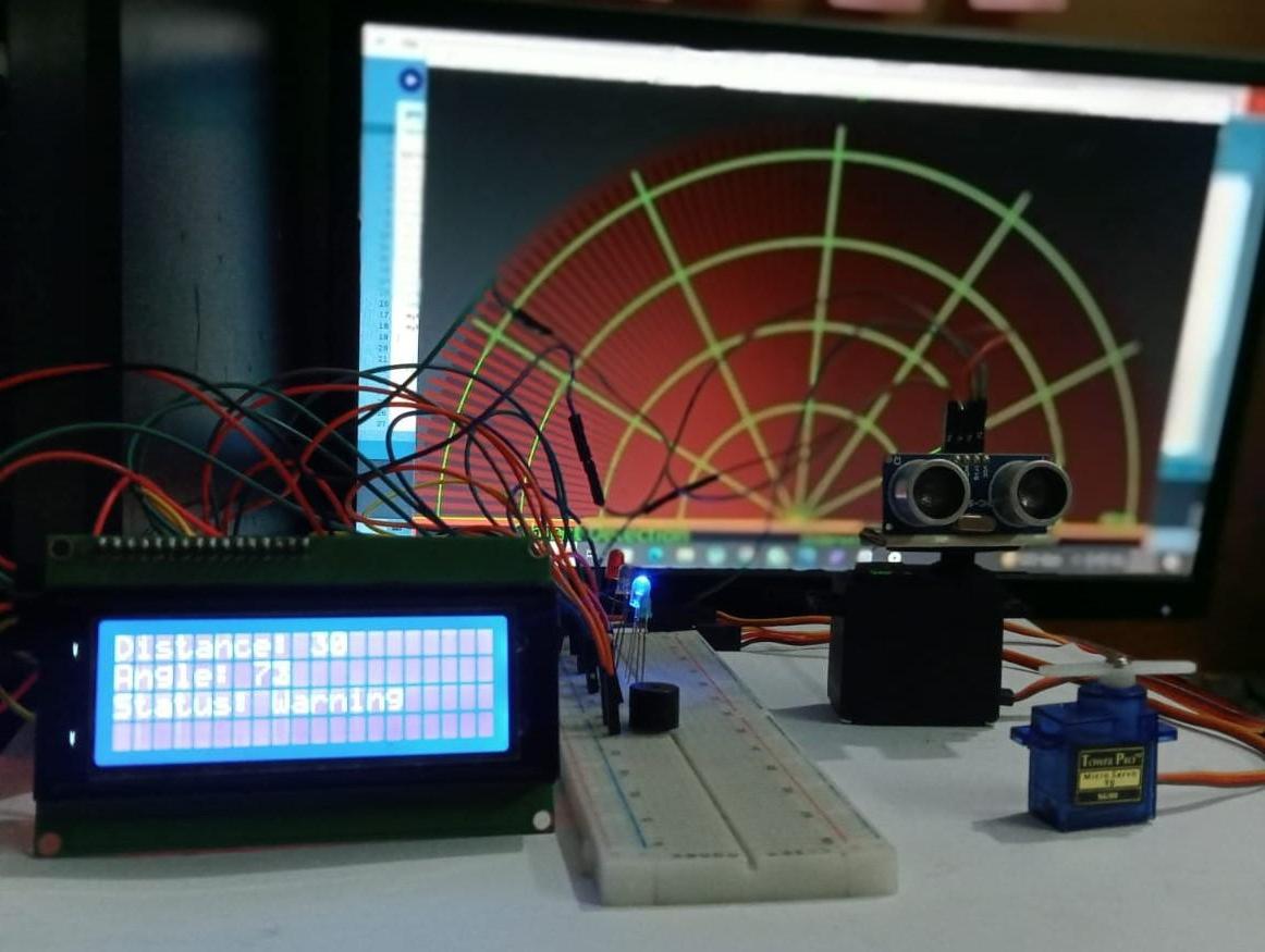 "Arduino Radar: Real-time Object Detection and Distance Monitoring System"
