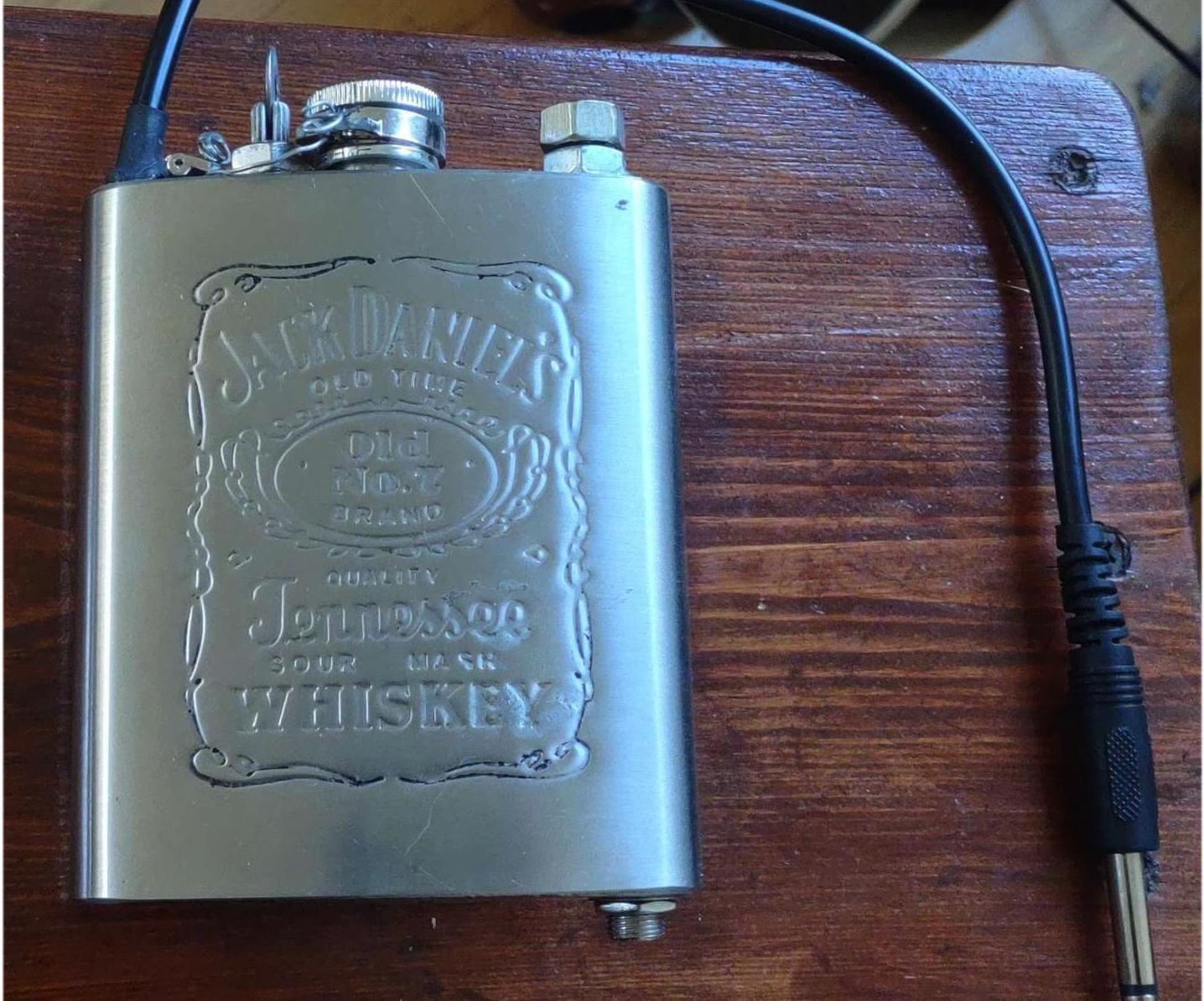 Volume and Tone Controls for an Electric Guitar in a Whiskey Flash.