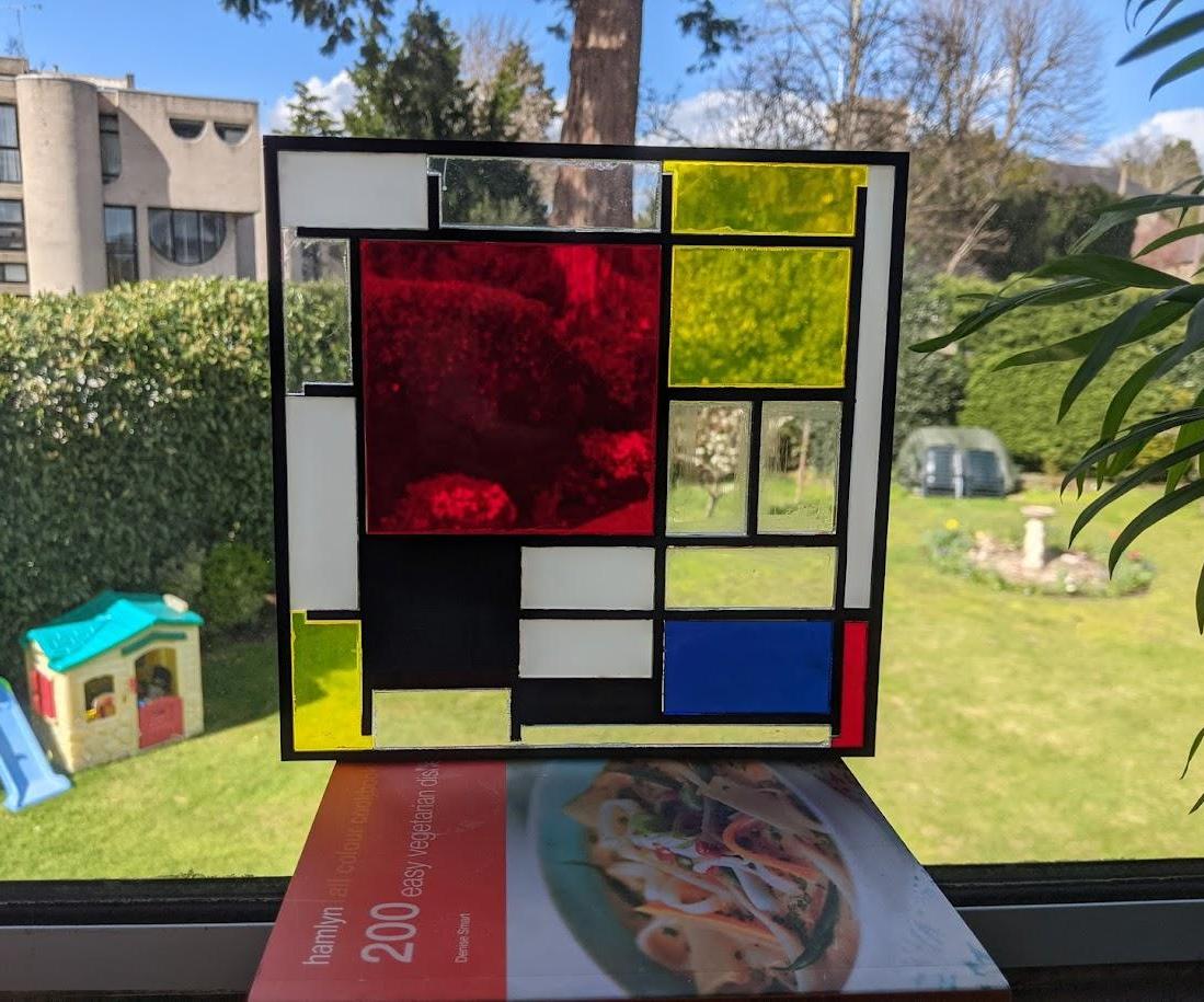 Laser-Cut Transparent Acrylic Artwork of a Piet Mondrian Composition With Large Red Plane, Yellow, Black, Grey and Blue, 1921