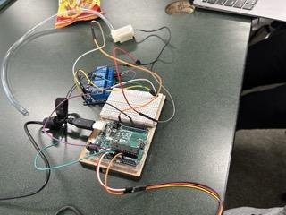 Using a Arduino, Relay Module and Soil Moisture Sensor to Control a Water Pump.