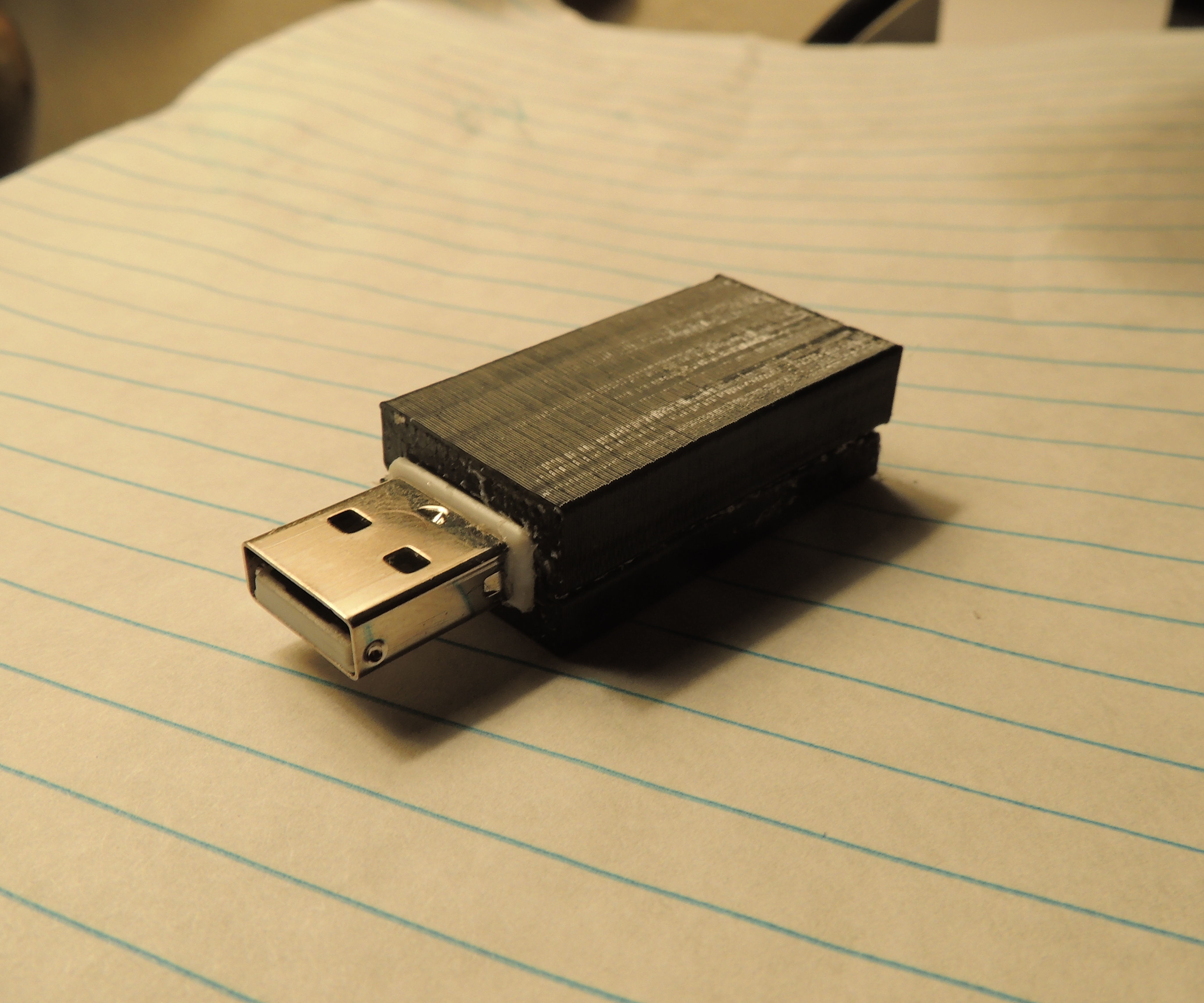 Hidden flash drive in mouse dongle