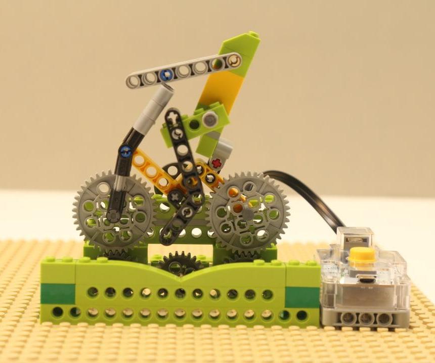 This Project Is a Lively Desktop Replica Model of a Man Riding on a Bicycle. Powered by a Cherry Tart, It's DIY, Fun, and Interactive.