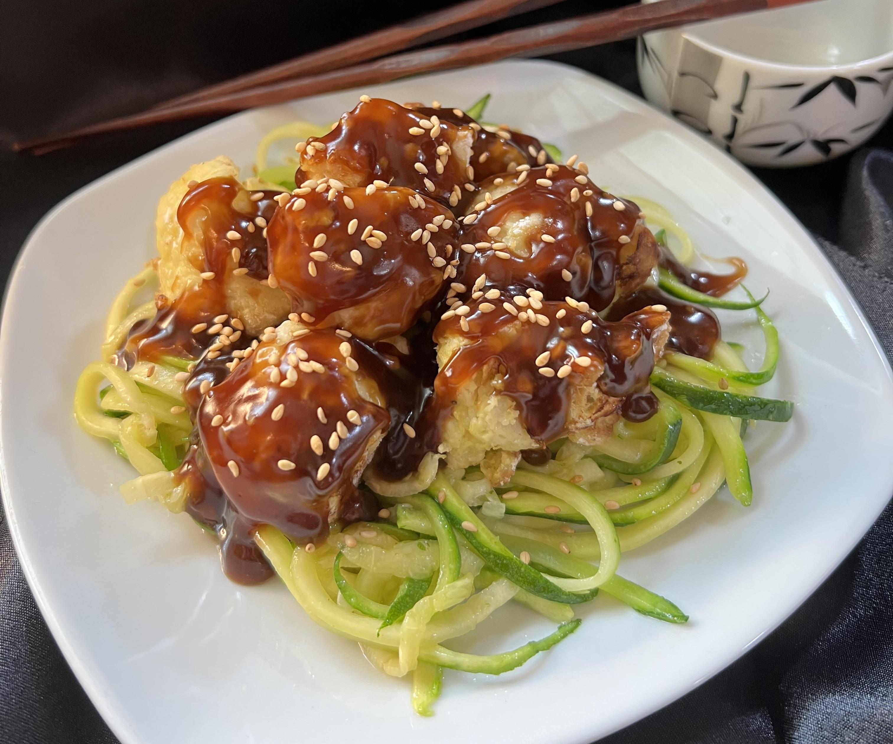 Sticky Sesame Cauliflower Over Zoodles
