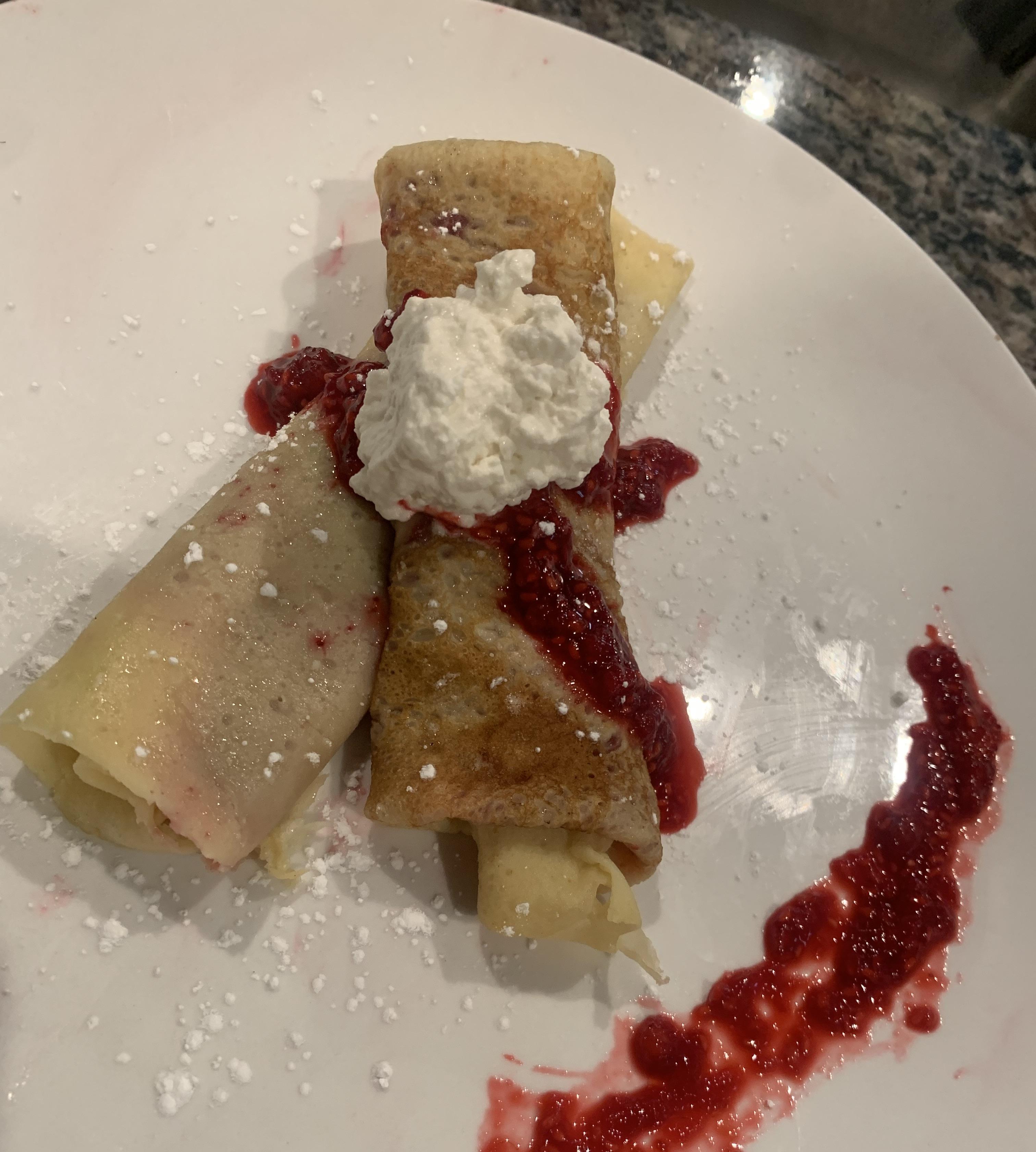 Crepes With Raspberry Compote and Homemade Whipped Cream.