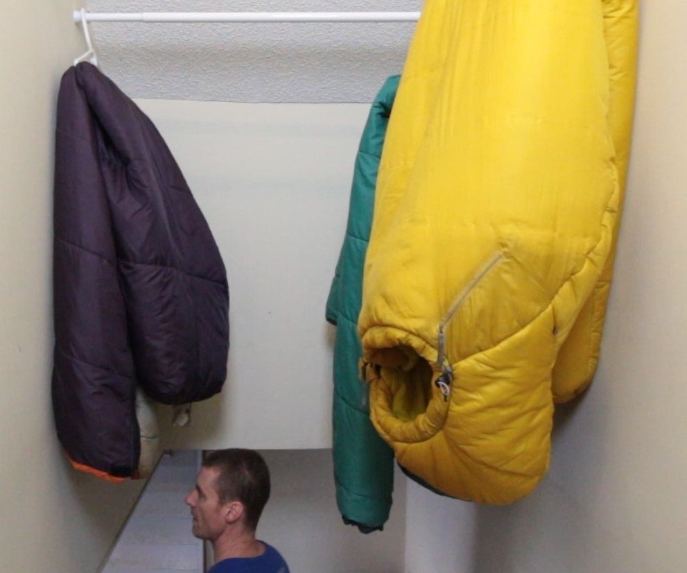 Stairway Overhead Shower Rod Sleeping Bag Storage