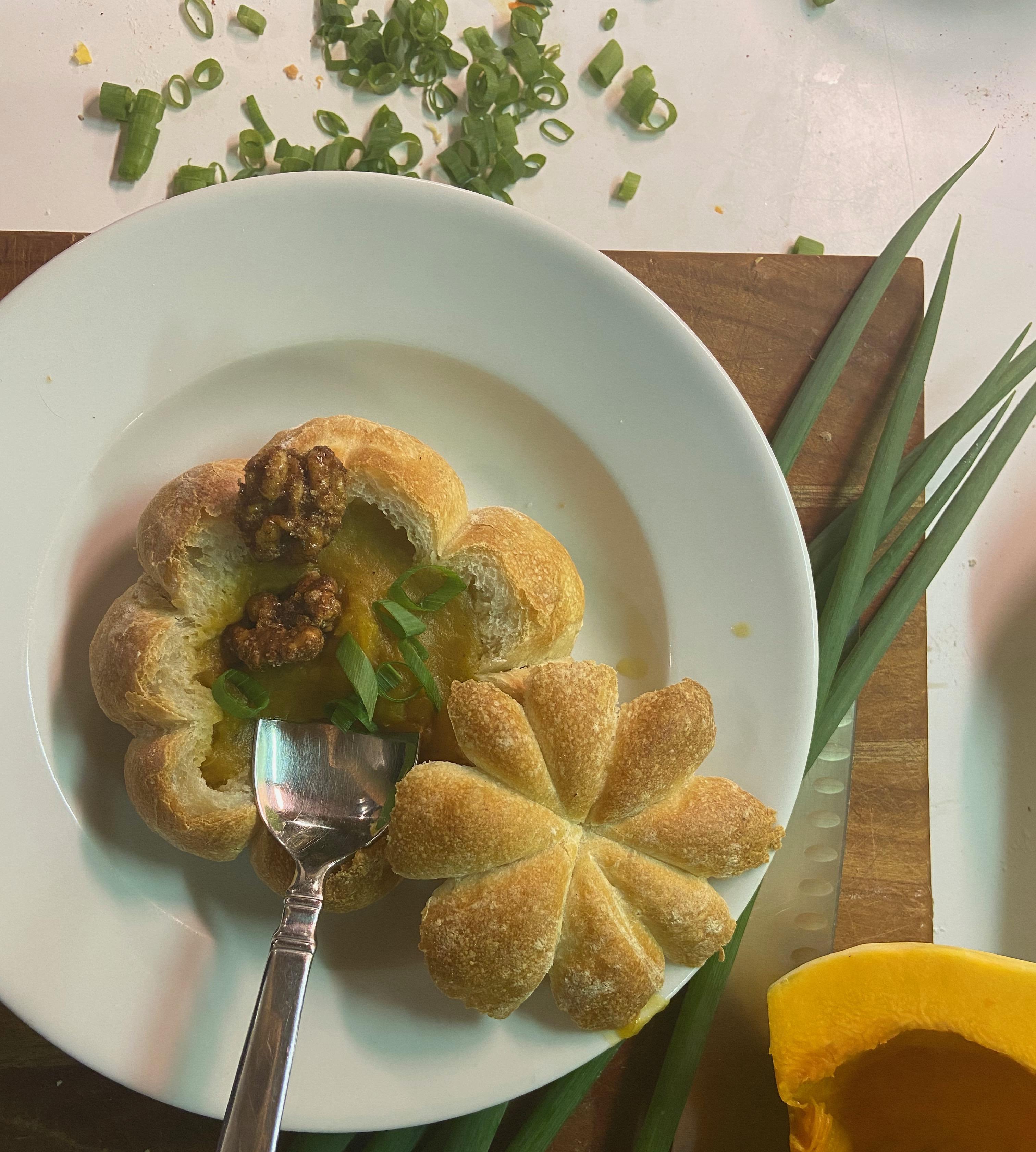 Fall Harvest Soup Served in Pumpkin-shaped Bread Bowls