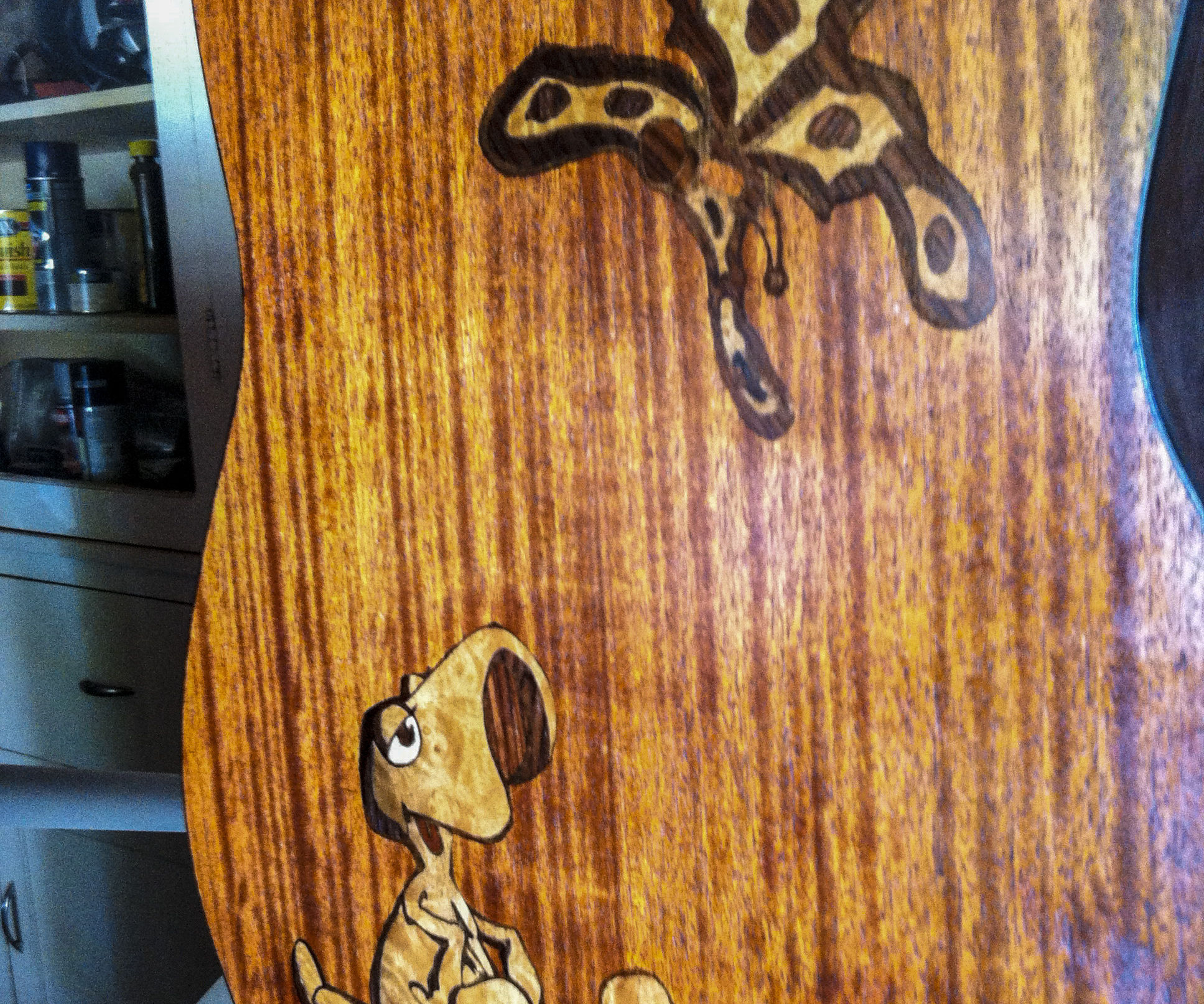 "Cartoon-style" Inlay on an Acoustic Guitar